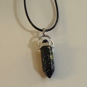 NWOT Black Hexagonal Point Pendant with Purple and Gold Flakes on Black Cord